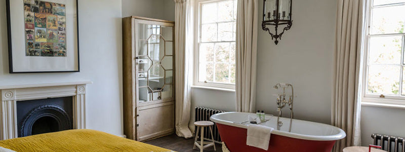The Park - bathroom and bedroom|Inside an older property with wooden beams.