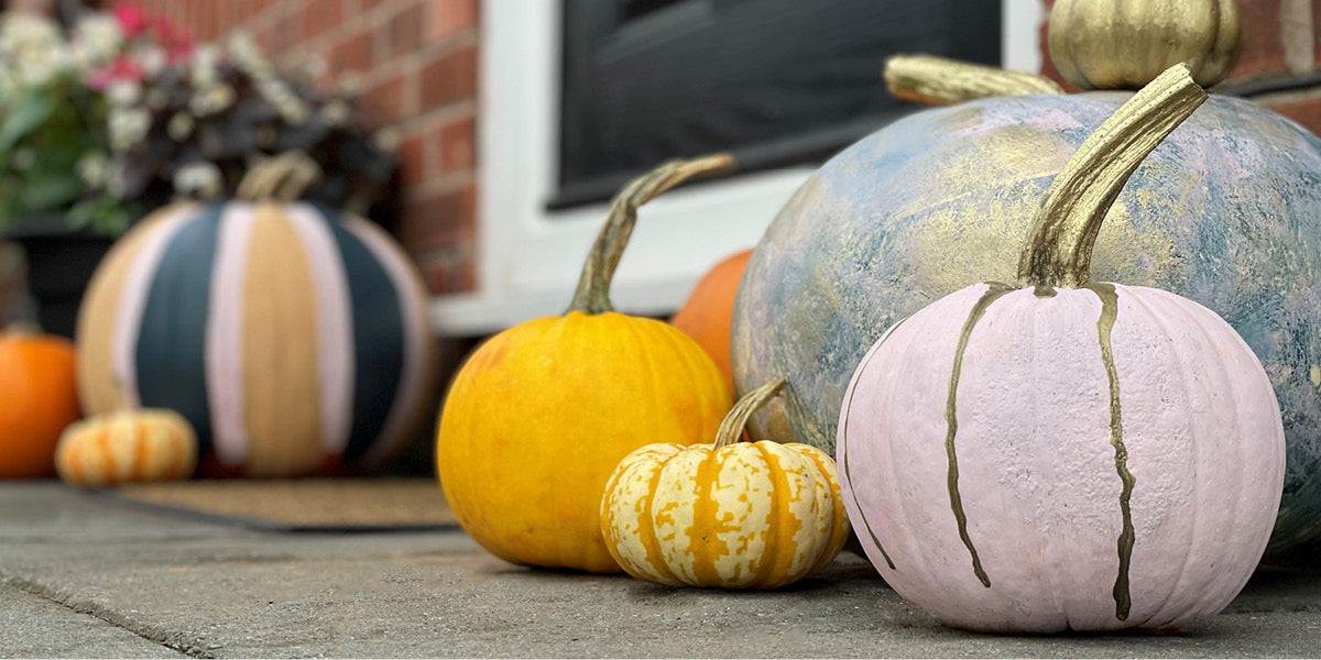 Painted pumpkins.|Split image close up of painted pumpkins.|Painted pumpkins on the porch.