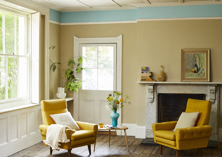 A sitting room painted in Crocky Road and Milk Jug Claypaint.|Introducing Crocky Road in a breathable paint.|Crocky Road and Milk Jug above a fireplace.