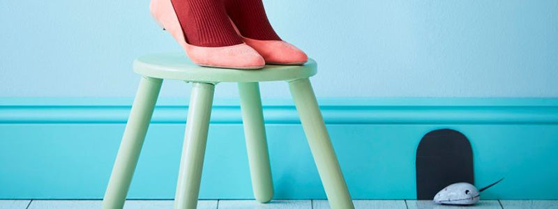 Paint colours for woodwork|Paper paint swatches on a wall.