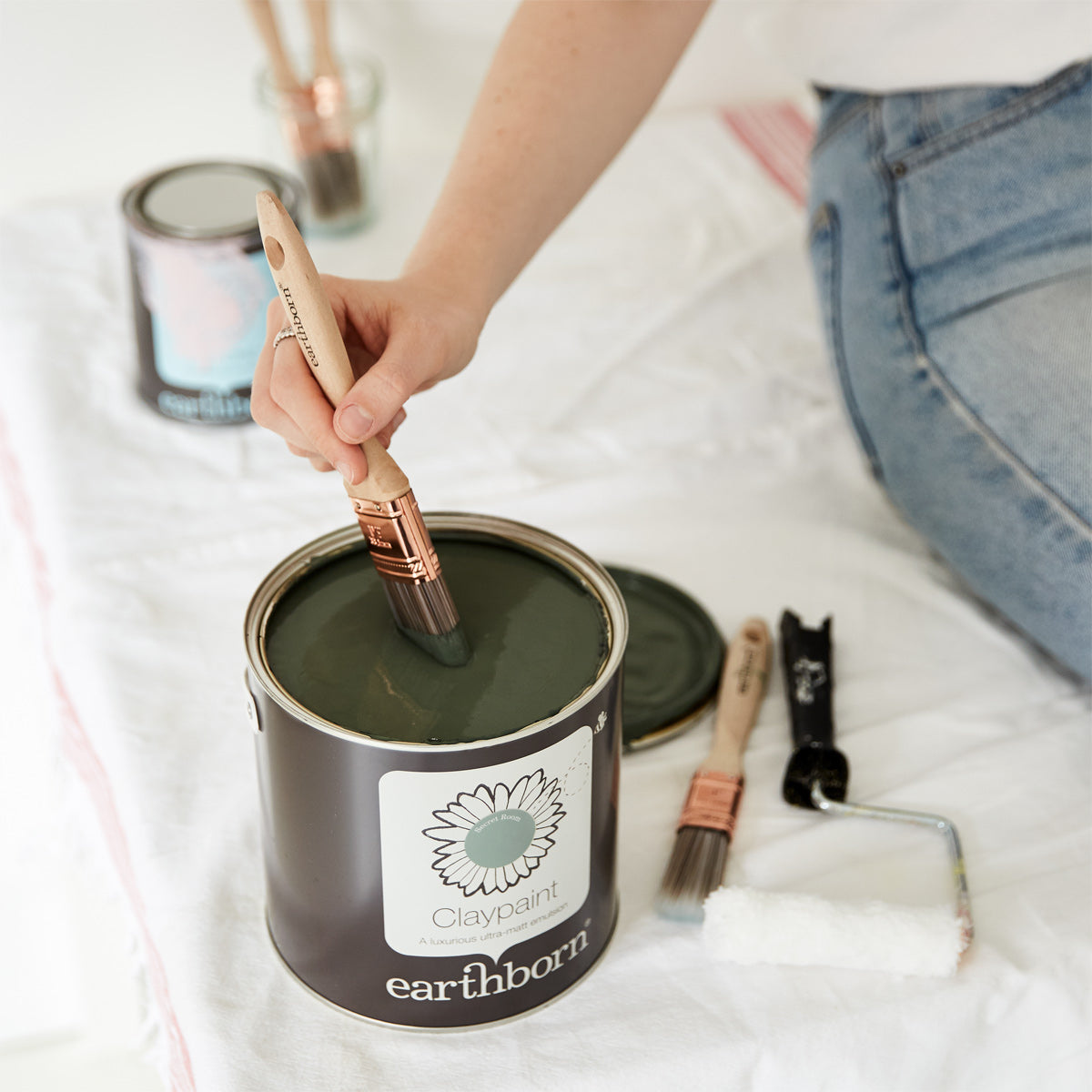 Reading room social post image.|Collage of bedroom inspiration.|Earthborn Claypaint tin and paint brushes set up.|Painted bedroom in bold colours.|Living Room ft. Sunday Stroll