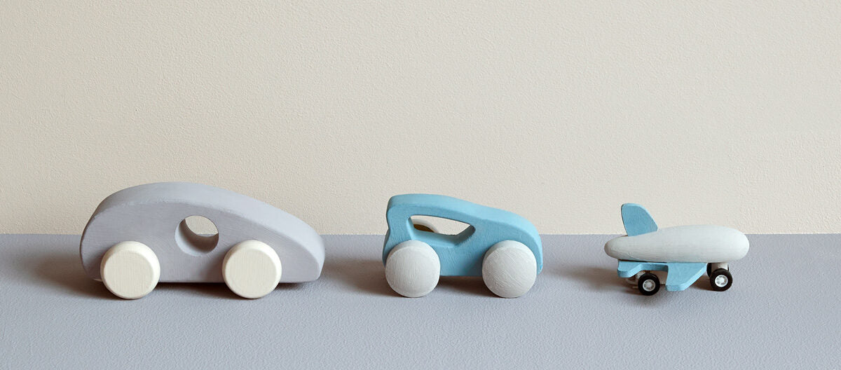 Painted childrens toys|Kids room|Paw Print Claypaint.|Earthborn paint tins stacked.|Child's playroom in Fiddlesticks.