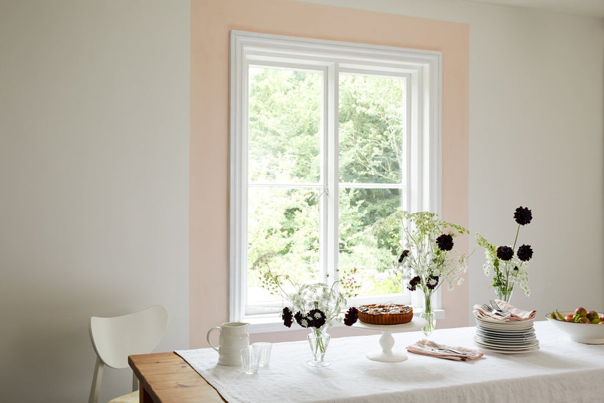 Up Up Away dinning room.|Kitchen in Sandy Castle.|Fireplace painted in Flutterby Claypaint.|Grassy bathroom.|White Clay - neutral bedroom.