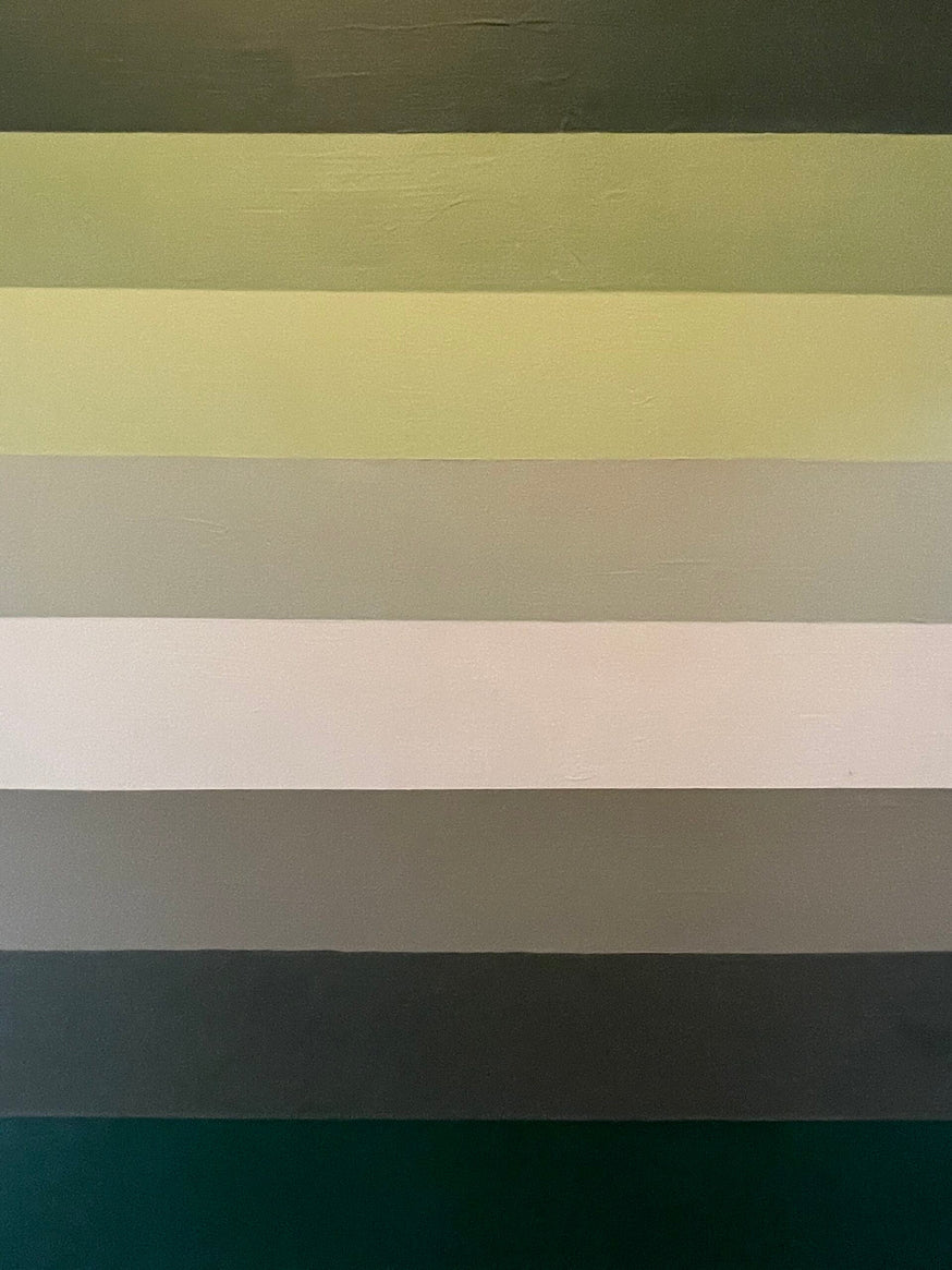 Green colour swatch stripes.|Bright yellow painted room with black and white checked flooring.|The Art Hostel - common room|Step inside - Leeds.|The Art Hostel - Leeds|Step inside - The Art Hostel|The Art Hostel in Leeds.