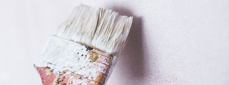 Paint brush painting a wall.|Image Credit: Ian Scott Decorating|