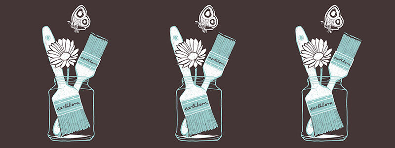 A jar of paint brushes with butterflies and flowers illustration.