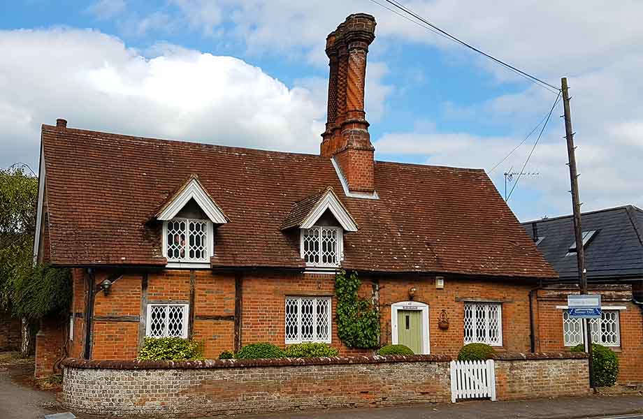 Refurbished listed cottage with its impressive feature chimney uses breathable Earthborn Claypaint throughout