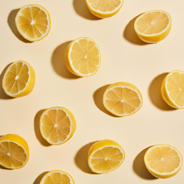 Jemima flat lay with lemon halves.
