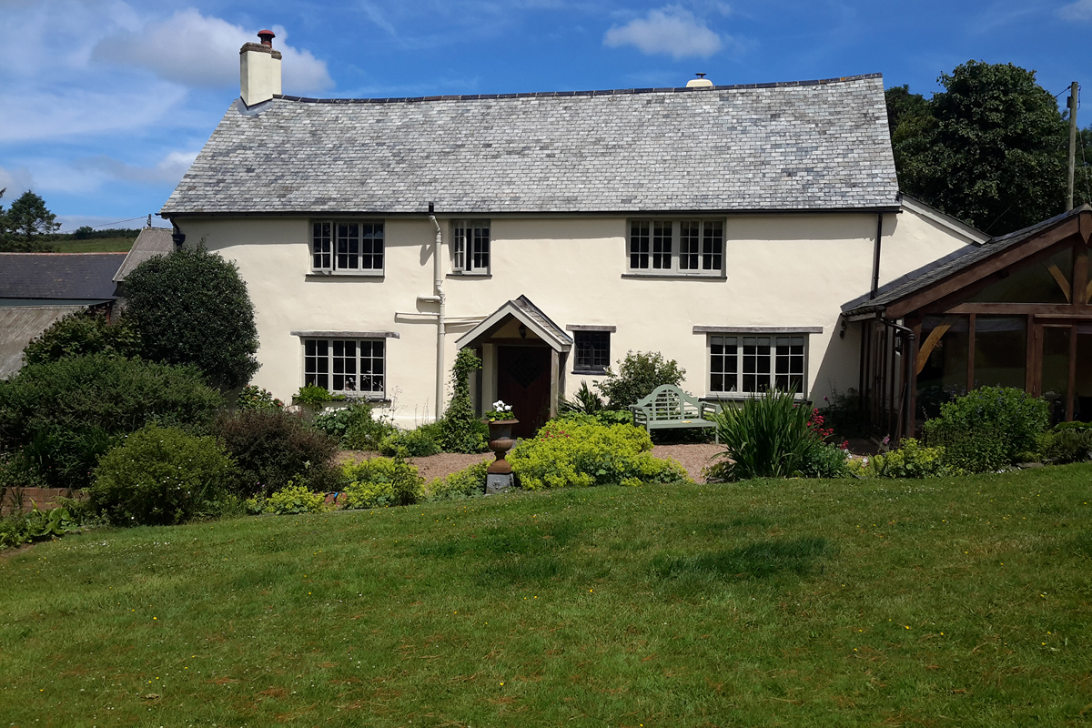 Our breathable masonry paint in the colour 'Sandstone' was used on this medieval home