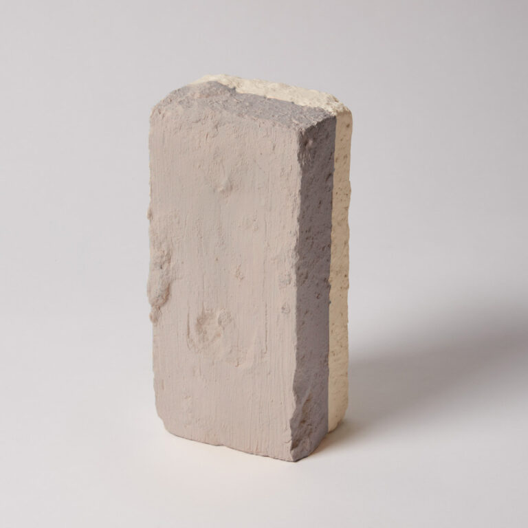 A painted brick with Silicate Masonry Paint to show the finish.