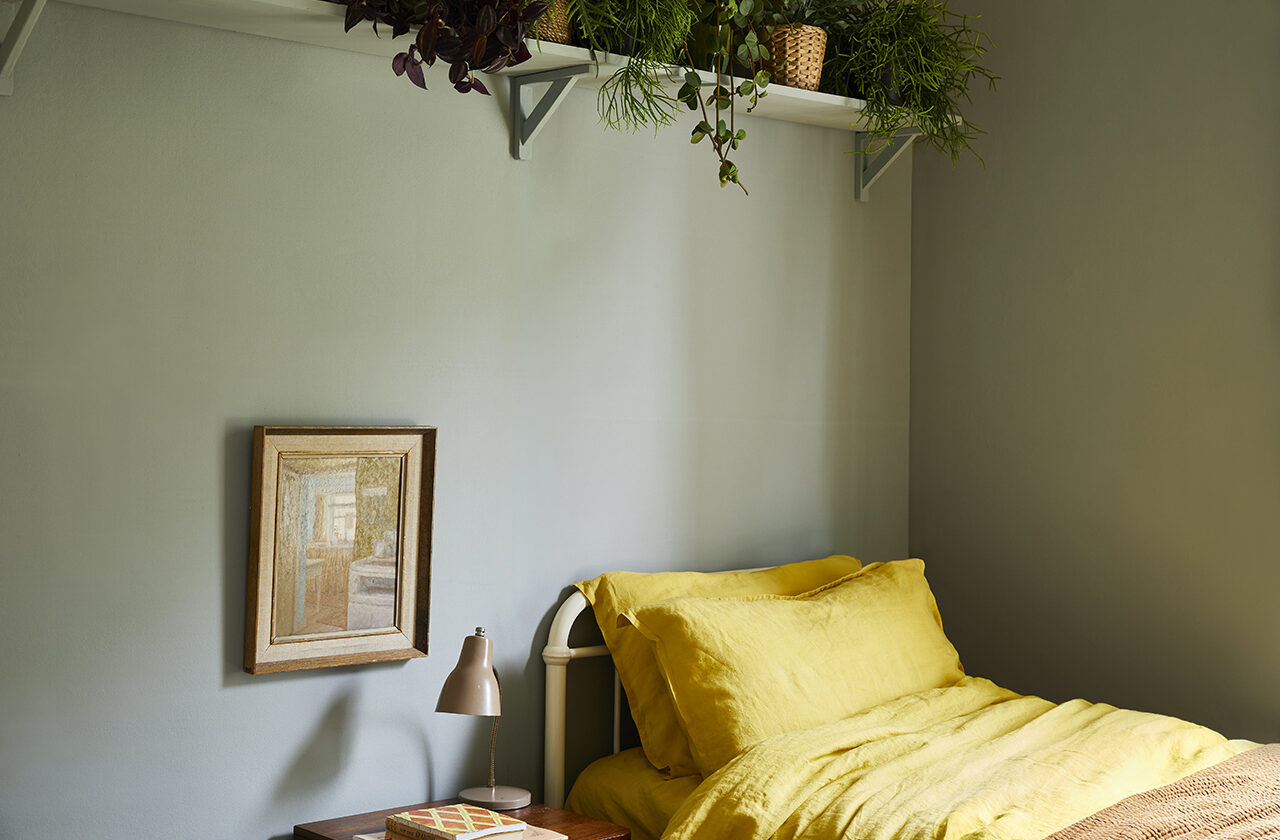 A bedroom painted in Grassy Claypaint.