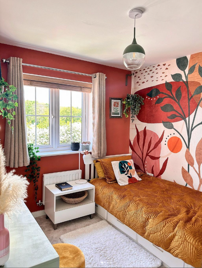 Bedroom layout with a pattern statement wall and large window.