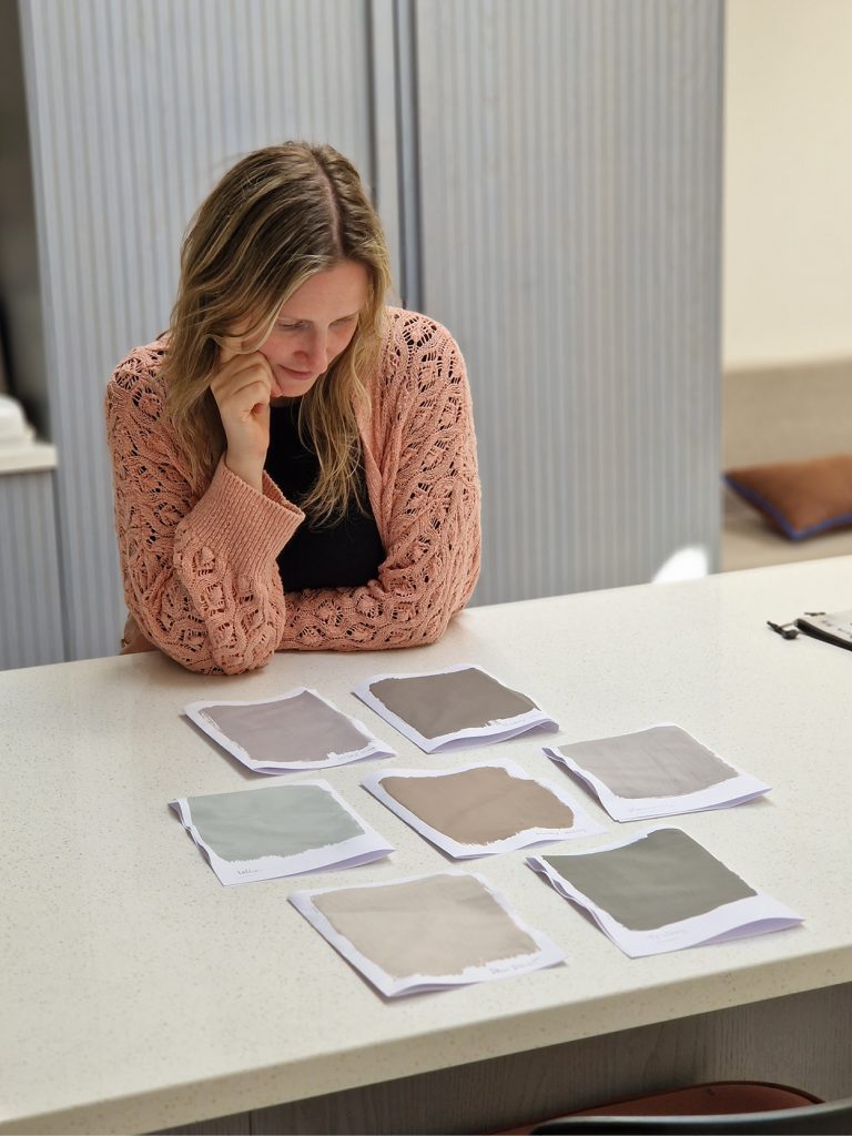 Choosing between paint swatches for Bray Coach House.